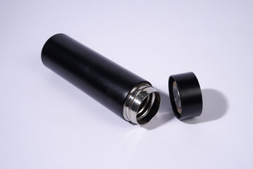 Open Black Thermos Bottle Revealing Stainless Steel Interior