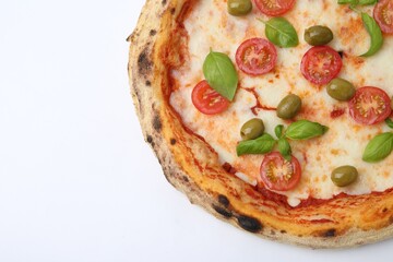 Delicious pizza with tomatoes, olives and basil on white table, top view. Space for text