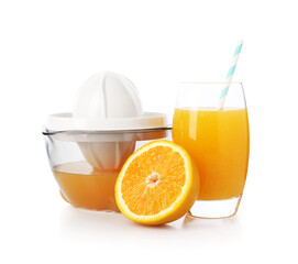 Tasty orange juice, cut fresh fruit and juicer isolated on white