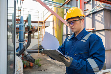 Petrochemical engineer working at petroleum oil refinery industry area. Industrial technician...