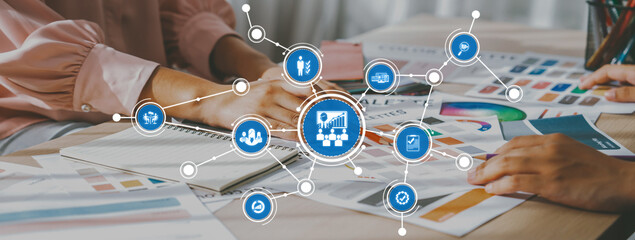 This image showcases collaborative management strategies with a focus on teamwork and innovative...