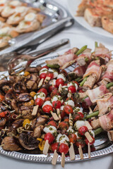 Catering appetizers displaying delicious wedding finger food on silver tray