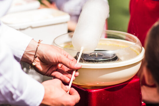 Chef preparing cotton candy at wedding reception