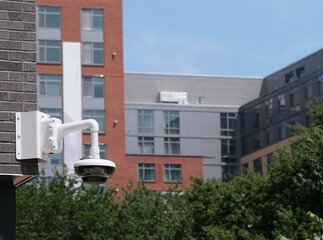 Security camera on the outside of a modern building in the city