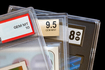 Professionally Graded Sports Cards, Different Styles, On Black Background