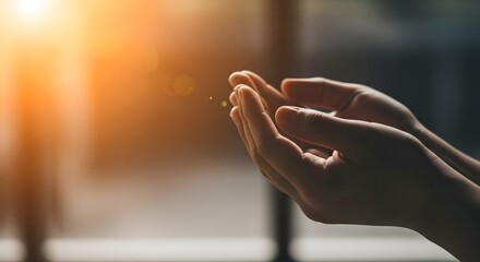 Open hands receiving light hope and faith concept for prayer meditation and spirituality image