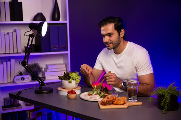 Healthy influencer in host channel tasting chicken meat ingredient health on diet life in mixed salad for easy cooking product by self with tasty food on social media live on meal time. Surmise.