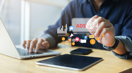 close up young employee use stylus pen to check on virtual dashboard of ads marketing for planning about reach target on website for business technology of search engine concept