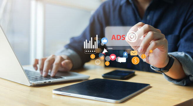 close up young employee use stylus pen to check on virtual dashboard of ads marketing for planning about reach target on website for business technology of search engine concept