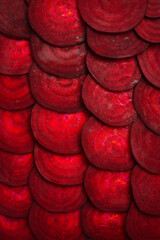Red vegetable texture. Macro photo of beetroot. Top view.