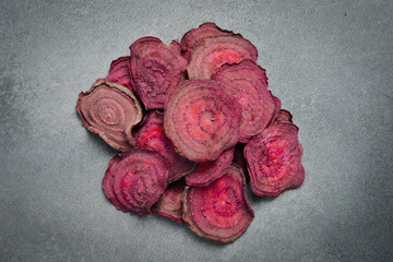 red dried beet chips, ideal for healthy eating concepts. Food concept.