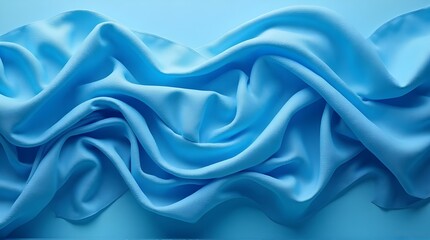 Obraz premium Flowing twisted blue cloth background 