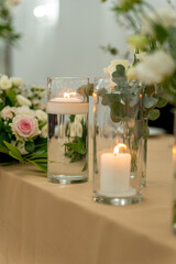 Evening elegance unfolds with candles and blooms in a charming celebration setting