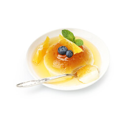 Tasty panna cotta with orange, blueberries and mint isolated on white
