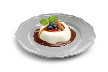 Tasty panna cotta with blueberries, almonds and sauce isolated on white