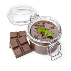 Delicious panna cotta in glass jar, pieces of chocolate and mint isolated on white