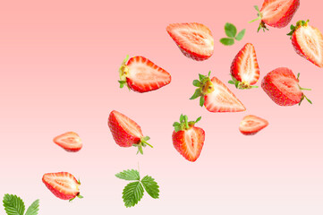Fresh juicy strawberries and green leaves flying against pink gradient background