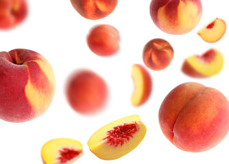 Fresh peaches whirling in air against white background