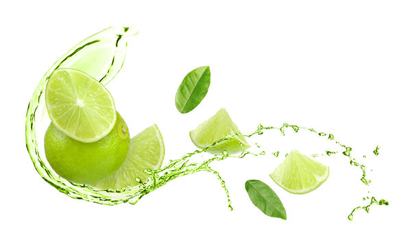 Fresh limes, leaves and drink splash in air against white background - Powered by Adobe