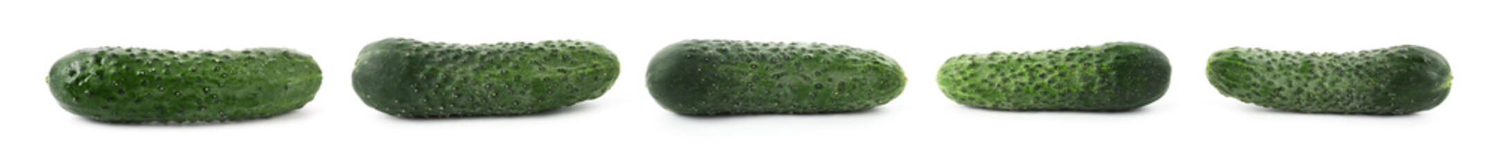 Fresh ripe cucumbers isolated on white, set
