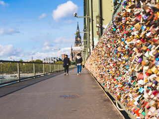 Love Locks on the Hohenzollern Bridge and the view of cathedral in Cologne, Germany