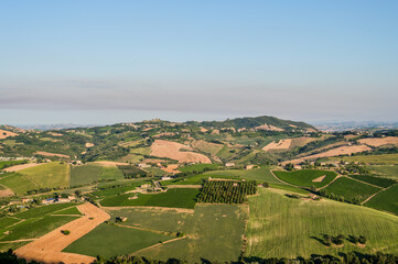 The Marche, a region of eastern Italy, rises between the Apennine mountains and the Adriatic Sea.