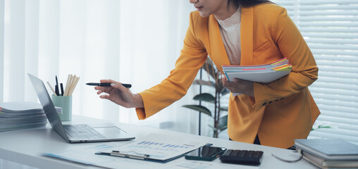 Smart Solutions: A focused professional navigates the digital realm, seamlessly blending modern tech with the demands of the modern work environment.