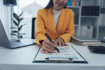 Business financing accounting banking concept. Business woman hand doing finances and calculate on...