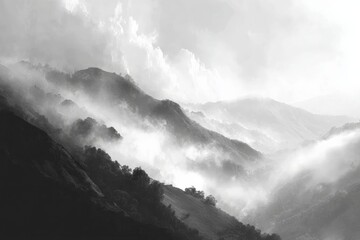 Mountain landscape with misty valleys and dramatic clouds during early morning hours