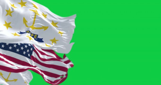 Rhode Island flags waving with the american flag isolated on green background