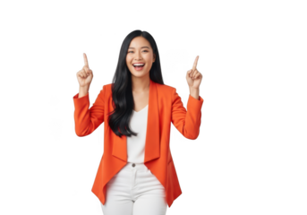 Happy asian woman in orange blazer and white pants pointing up with index fingers, isolated on transparent background