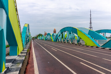 Napier Bridge is a road bridge over the Coovum River in Chennai, India. It connects Fort St. George with the Marina Beach. The first iron bridge was built in 1869, which was rebuilt in 1909 and 1944.