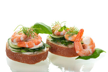 appetizing sandwich with salad and shrimps on a white background