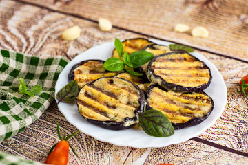 Homemade eggplant appetizer with garlic, herbs and cheese