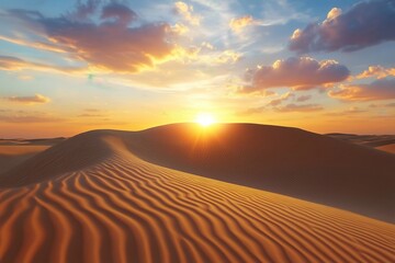 Serene desert landscape featuring wind-sculpted sand dunes glowing in warm sunset light. The sky is painted with soft clouds and vibrant colors, capturing the beauty and tranquility of a remote desert