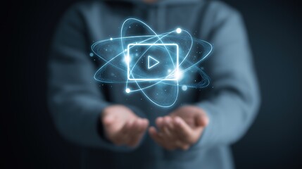 Virtual Meetings and Remote Collaboration – Faceless Casual Professional Holding Glowing Video Icon with Orbiting Nodes, Digital Communication and Teamwork Concept

