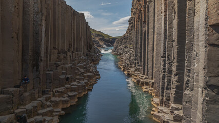 Studlagil Canyon with Basalt Columns and Turquoise River in Iceland
