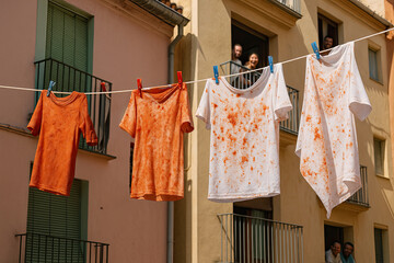 Tomato-Stained Clothing Hung on Line After La Tomatina Festival