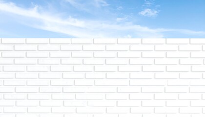 White brick wall against a clear blue sky