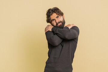 Come to me, I want to embrace you. Indian handsome man spread hands and give hug to you. Pleasant...