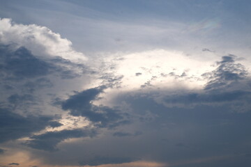 Sunset on blue sky. Blue sky with some clouds. blue sky clouds, summer skies, cloudy blue sky. High quality photo
