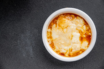 Rice pudding caramel syrup sweet dessert snack fresh delicious gourmet food background on the table rustic food top view copy space