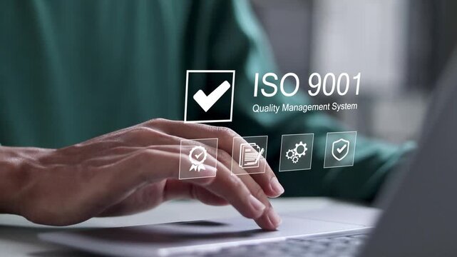 QMS, ISO 9001 Quality Management System concept. Certified and quality management of organizations. Person using laptop to choose ISO 9001 on virtual screen. 