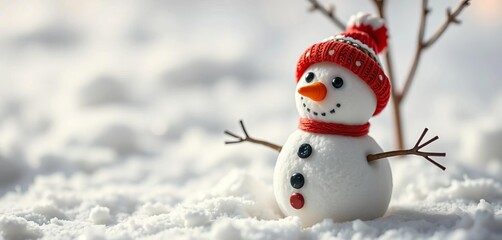 Fototapeta premium Miniature snowman with carrot nose in snowy scene, whimsical winter decor, design, hygge