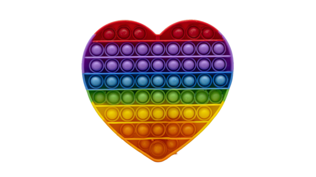 Color pop it anti stress toy for children. rainbow heart shaped isolated on white background . Pop it toy