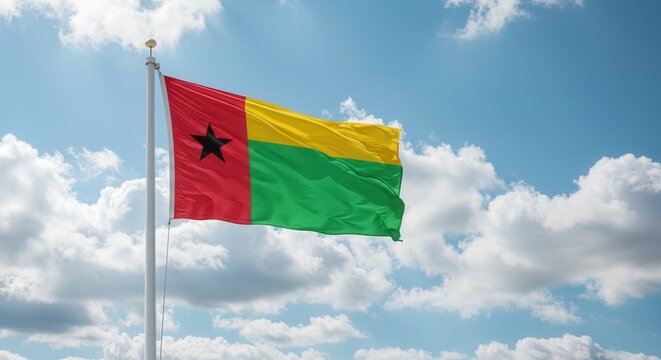Guinea Bissau National Flag Waving on Tall Flagpole in Sky with Clouds – Guinea Bissau Independence Day Celebration, Patriotism, Freedom, Guinea Bissau Culture & Heritage