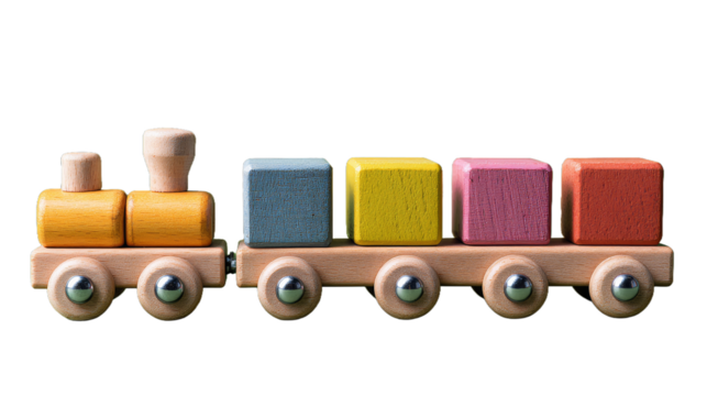 Wooden toy train with colorful blocks on green background