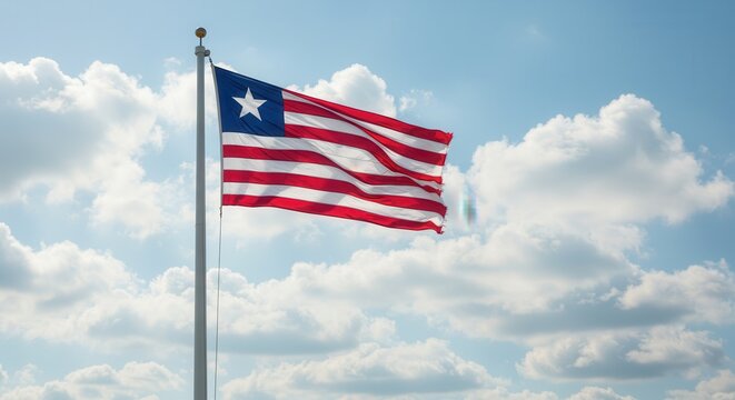 Liberia National Flag Waving on Tall Flagpole in Sky with Clouds – Liberia Independence Day Celebration, Patriotism, Freedom, Liberia Culture & Heritage