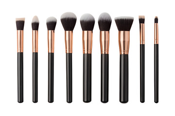 A set of nine makeup brushes with black handles and gold accents on a white background