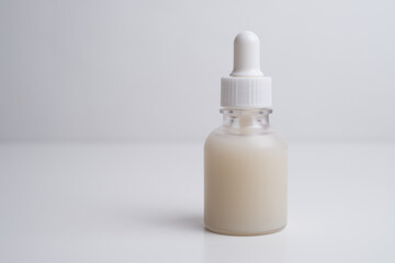 Container for cream, shampoo, toiletries, spa. Unbranded bottles. Bottle with a dispenser for cosmetic products. Skin care and beauty concept. Mockup style, copy space